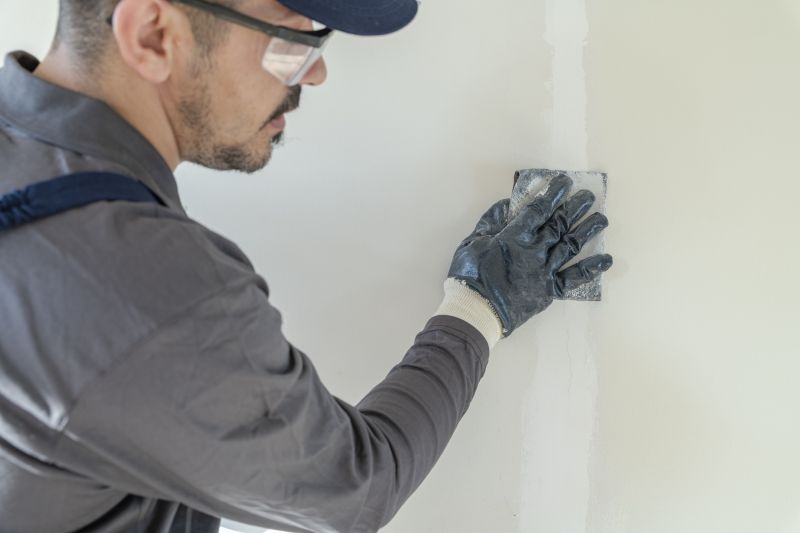 Sandpapering Drywall Surface